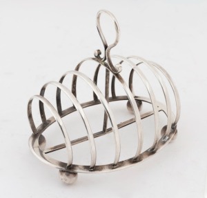 176 · An antique Australian silver toast rack, 19th/20th century, stamped "W. BRO. STERLING SILVER", 14cm high, 224 grams