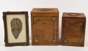 120 · An antique Australian folk art painted gum leaf, together with two vintage wooden canisters, (3 items), the frame 18 x 12.5cm overall