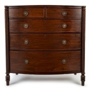 A William IV antique Scottish mahogany bow front chest of five graduated drawers with full length quilled columns on finely turned feet, circa 1835, 117cm high, 119cm wide, 51cm deep