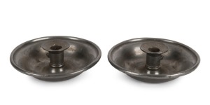 129 · A pair of Georgian pewter candle holders with removable drip pans, 18th century, 17cm diameter