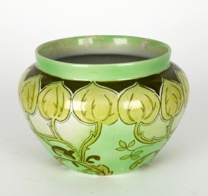 An Arts & Crafts porcelain jardiniere, circa 1900, 14cm high, 20cm wide
