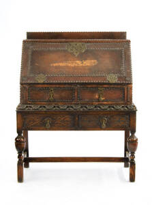 An unusually studded leather and brass-mounted bureau, English circa 1900. Height 116cm, width 94cm, depth 50cm