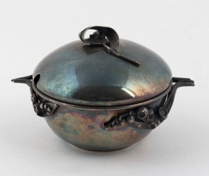 A silver plated lidded sugar bowl with applied lily of the valley decoration, 20th century, 7cm high, 11cm wide