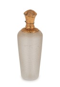 An antique ribbed glass scent bottle with gold top, 19th century, ​​​​​​​9cm high&nbsp;