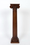 A classical style pedestal with carved Ionic capital, fluted tapering trunk and&nbsp;moulded plinth base, 20th century, 97cm high, 22.5cm wide, 20cm deep