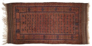 A hand-woven tribal rug with brown background, 200 x 105cm