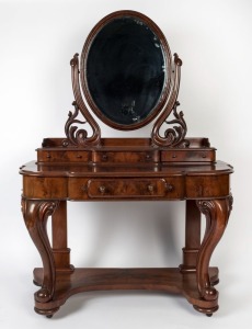 An antique English dressing table, flame mahogany with carved cabriole legs and oval mirror, 19th century, 170cm high, 120cm wide, 53cm deep