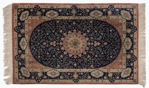 Qum Persian hand-knotted silk rug on blue ground, 155 x 100cm