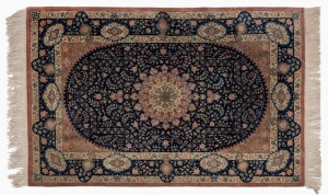 Qum Persian hand-knotted silk rug on blue ground, ​​​​​​​155 x 100cm