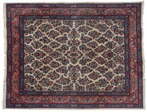 A Persian hand-knotted wool rug on cream and pink ground, 265 x 223cm