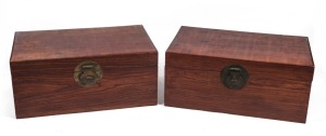 A pair of Chinese camphorwood trunks, 20th century, 41cm high, 93cm wide, 56cm deep