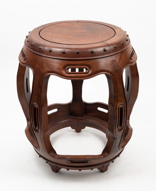 A Chinese rosewood drum stool, 20th century,  ​​​​​​​45cm high 