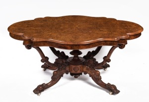 A fine antique English burr walnut centre table with handsome quarter book-matched veneered shaped top, and superbly carved basket base, 19th century, 72cm high, 152cm wide, 111cm deep