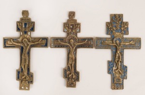 OLD BELIEVERS three Russian bronze crosses with remains of blue and white enamel decoration, 20th century, the largest 16.5cm high