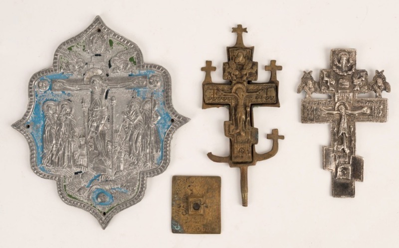 OLD BELIEVERS Russian bronze shrine cross, together with a silver cross, and a white metal icon with remains of blue finish, 19th/ 20th century, (3 items), the silver example 11cm high