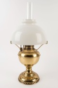 An antique&nbsp;American brass oil lamp with milk glass shade, 19th/20th century, ​​​​​​​53cm high
