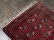 A Turkoman Persian hand-knotted wool rug red ground, 142 x 100cm - 2