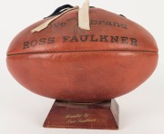 THE 1970 PREMIERSHIP TROPHY: The Ross Faulkner "native brand" football presented to IAN ROBERTSON as a member of the 1970 Carlton Premiership Team; with added blue and white ribbons, the ball is mounted on a wooden plinth engraved with "Carlton Football C - 2