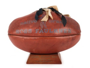 THE 1968 PREMIERSHIP TROPHY: The Ross Faulkner "native brand" football presented to IAN ROBERTSON as a member of the 1968 Carlton Premiership Team; with added blue and white ribbons, the ball is mounted on a wooden plinth engraved with "Carlton Football C