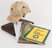 1979 PAKISTAN CRICKET TEAM: Match worn batting helmet signed by 15 members of the Pakistan touring party, attractively displayed on a custom built timber base. Accompanied by "The Pakistan Book of Test Cricket 1952-53 - 1982" by Abid and Masood as well as - 8