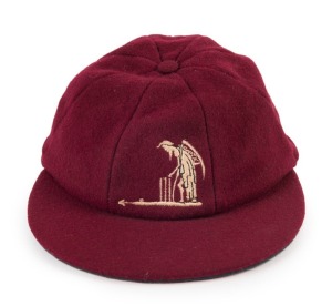 LORD'S maroon woollen cricket cap with "Old Father Time" logo embroidered to front panel; made by Jack Hobbs Ltd., Islington. 