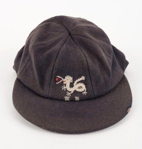 HONG KONG CRICKET TEAM: Peaked woollen cap with embroidered logo to front panel. Match worn; player unknown.