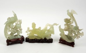 Three assorted Chinese carved jade statues, on timber stands, 20th century, ​​​​​​​20.5cm high