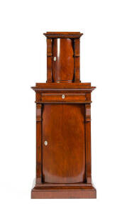Biedermeier mahogany 2 door cabinet of unusual bow front form, early to mid 19th century. Height 150cm, width 60cm, depth 46cm