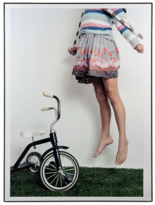 ARTIST UNKNOWN, (a girl and a tricycle), large format photograph laid down on board, 127 x 92cm overall