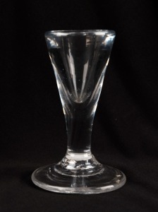 An antique toast master's glass, 19th century, 10cm high