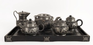 YIXING tea set, Zisha black clay with pewter overlay, circa 1900, (6 pieces), the tray 51cm wide