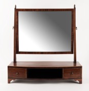 A Georgian mahogany two drawer toilet mirror (missing central drawer), circa 1820, 60cm high x 55cm wide x 22cm deep