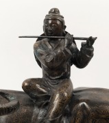 A Chinese bronze statue of a flute player sitting on a bull, 20th century, ​​​​​​​45cm high, 51cm long - 2