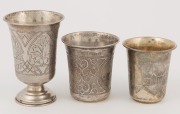 Three antique Russian silver beakers with engraved decoration, 19th century, the largest 8.5cm high - 2