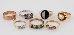 Seven assorted gold rings with stones, (9ct and 18ct), ​​​​​​​33 grams total