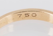 An 18ct yellow gold ring, set with a row of three white diamonds, 20th century, 3.2 grams - 4