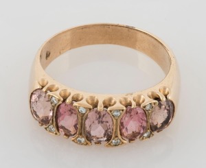 An antique 9ct yellow gold ring, set with a row of five pink topaz interspersed with white diamonds, 19th/20th century, ​​​​​​​3.8 grams 