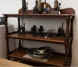 DUMB WAITER: Victorian mahogany 3 tier servery with later casters. Height 140cm, width 138cm, depth 54cm