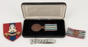 Military medal, badges and a watch bracelet (branded Rolex)