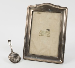 A Georgian sterling silver caddy spoon, together with a sterling silver picture frame, (2 items), the spoon 8cm long