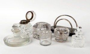 Assorted antique glass ink pots and wells, together with an antique black glass letter rack with silver plated mounts and floral enamel decoration, 19th and 20th century, (6 items), the letter rack 16cm wide