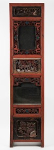 An antique Chinese carved wooden panel with remains of gilt and lacquered finish, Qing Dynasty, 19th century. Note: later mirror inserts. ​​​​​​​124 x 29cm