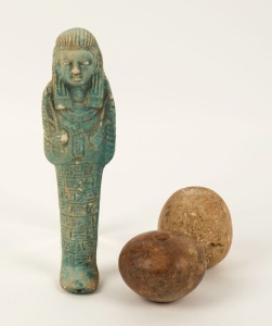 An Egyptian Ushati, together with two stone mace heads, unknown ages, the Ushati 14cm high