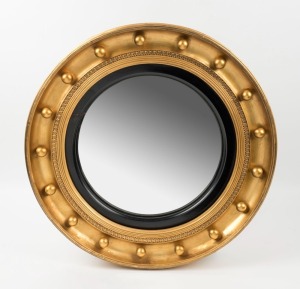 A Regency style circular wall mirror, convex glass with reeded and ball studded mouldings, circa 1910, 56cm diameter