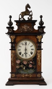 An antique parlour clock in timber case adorned with metal horse finial and fittings, eight day time and strike movement with Roman numerals, late 19th century, 53cm high