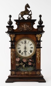 An antique parlour clock in timber case adorned with metal horse finial and fittings, eight day time and strike movement with Roman numerals, late 19th century, ​​​​​​​53cm high