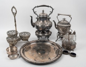 Silver plated table ware including two spirit kettles, cruet set, wine bottle coaster, salts, tray, bon bon dish and centrepiece stand with glass liners, 19th and 20th century, the tray 40cm diameter