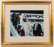 MIKHAIL GORBACHEV original signature on a photograph of him disembarking from an Aeroflot flight, circa 1990, framed and glazed 32.5 x 37.5cm overall