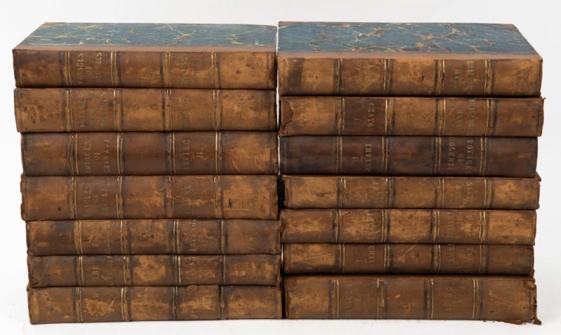 A WASHINGTON IRVING LIBRARY: Fourteen volumes in matching bindings (leather and marbled boards) comprising "The Sketch Book of Geoffry Crayon, Gent." (2 vols., 1820); "Bracebridge Hall; or The Humorists by Geoffrey Crayon, Gent." (2 vols., 1822); "Tales o