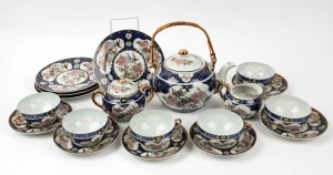 A vintage Japanese tea set, eggshell porcelain with geisha girl lithophane bases comprising, a teapot, milk jug and sugar bowl plus six cups and saucers and four side plates, 20th century, (19 items)